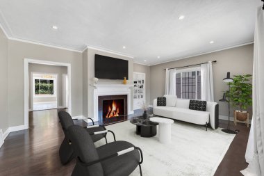 Kanepesi ve şöminesi olan modern bir oturma odası. 3d oluşturma