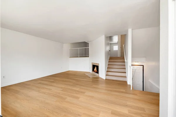 empty apartment with white walls and parquet flooring. 3d rendering