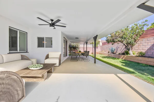 stock image interior with patio area sofa and chairs. 3d rendering of a terrace. 