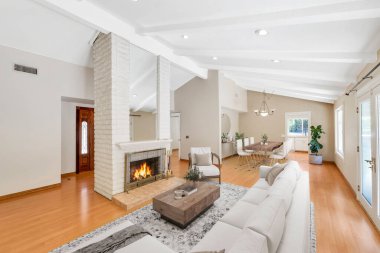 İçinde kanepe ve şömine olan modern bir daire. 3d oluşturma 