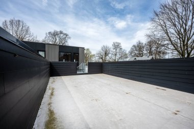 Şehrin modern siyah evi. 3d oluşturma