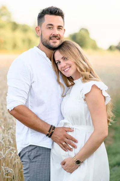 Young Pregnant Woman White Romantic Dress Hugging Man While Standing — Stock Photo, Image