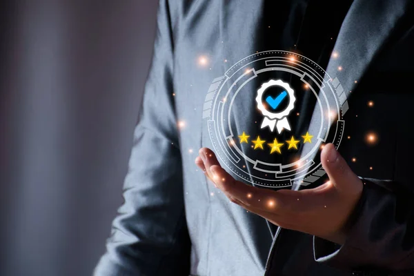 stock image concept of providing a five-star premium service. businessman showing award High standards are guaranteed, service quality, business success, work efficiency, top quality assurance five stars.