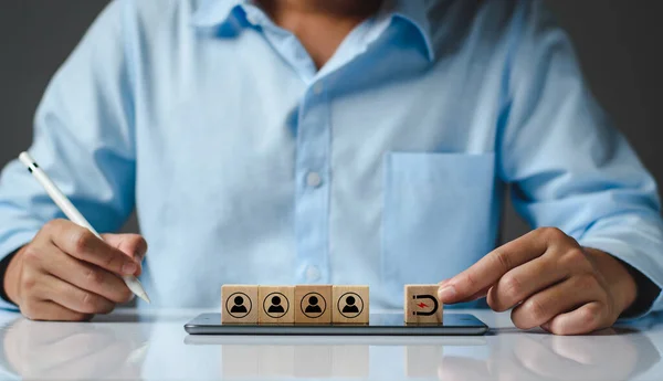 Inbound marketing strategy, customer retention, digital marketing and attracting potential customers in business concept. Wooden cubes with magnet icon attracts the customer icons. Business strategy.
