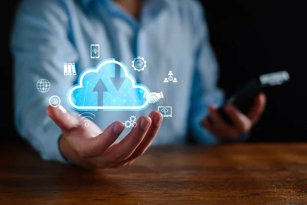 Businessman using cloud technology connect business data. Cloud computing concept idea show on hand. Internet Cloud technology. Digital Data storage. Network and internet service for business concept.