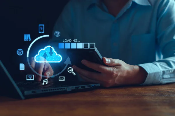 Data download from cloud computing concept. Man using smartphone and computer to download, upload business information, media files. Cloud computing technology, intelligent storage on Internet