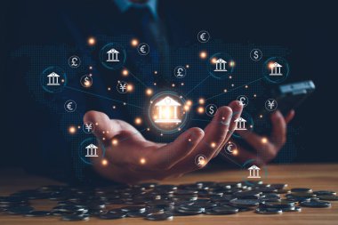 Merkez bankacılık ve uluslararası para birimi kavramı. İşadamı Yuan Yen Sterlin ve Euro 'yu para transferiyle takas ediyor. Uluslararası para birimi, dünya bankası