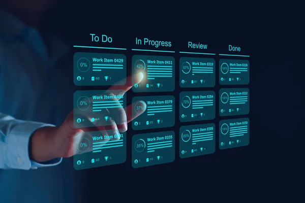 stock image Agile software development or project management using kanban or scrum methodology boards on screen. Process, workflow, visual organisation tools and framework. Developer touching virtual interface.