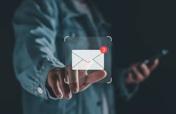 Email business marketing notification concept. Inbox receiving electronic message alert. Business email communication, digital marketing. business people touch on email in virtual screen technology.