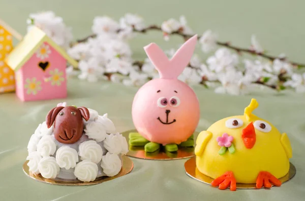 small cakes in the form of a lamb, bunny and chicken