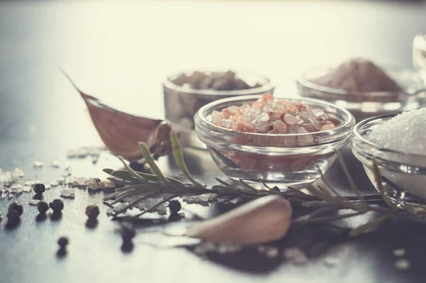 Different Types Salt Culinary Spices Glass Plates Dark Background — Stok fotoğraf