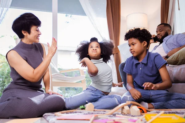 stock image African American Family Bonding over Playtime, Ideal for Family-Oriented Brands and Website