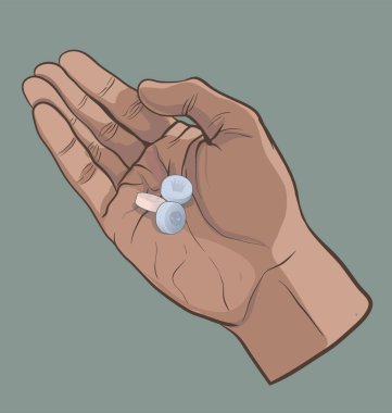 Ecstasy hapları tutan bir elin resmi.