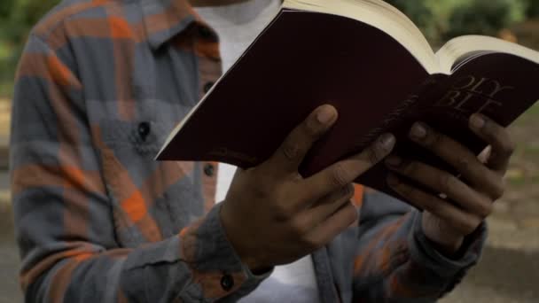Young Man Opens Eyes Reading Bible Praise Concept — Stock Video