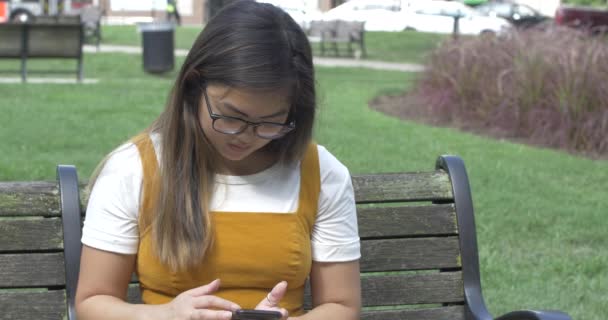 Gen Woman Looking Phone Park Internet Distraction Addiction — Stock Video