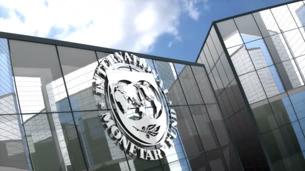 2018年10月 編集のみを使用します 3Dアニメーション ガラスの建物に国際通貨基金のロゴ — ストック動画