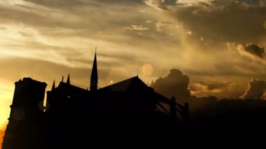 Notre Dame cathedral over sunset, 3d animation.