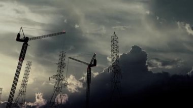 Animasyon, elektrik şebekesi inşaatı, inşaat vinçleri gün batımı.