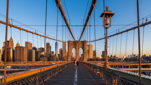 New York, USA, August 2022 - The Brooklyn bridge lighten by strong morning sunlight.