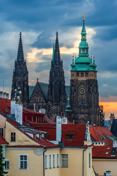 stock image The UNESCO world heritage site St. Vitus Cathedral (Katedrala svateho Vita) early in the morning sunrise under heavy rainy clouds.