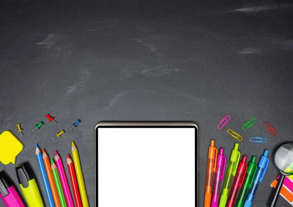 stock image Border composition of various colorful school supplies and digital tablet on blackboard background. Top view with copy space