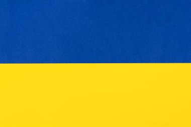 Ukrayna bayrağının renklerinde mavi ve sarı kağıt arkaplan