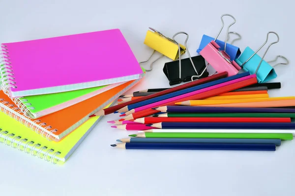 Books ,pen,pencil and office equipment on pink background, education and  back to school concept,Clipping path Stock Photo