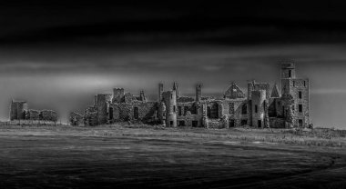 Atmospheric spooky black and white capture of Slain's castle by Cuden bay, the inspiration for Bram Stokes' Dracula clipart