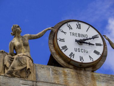 Aosta, Italy - August 4, 2022: View of the Trebino Clock in Emile Chanoux square. clipart