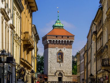 Krakow, Poland - August 12, 2022: View of the St. Florian's Gate in the old town. clipart