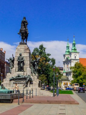 Krakow, Polonya - 12 Ağustos 2022: Plac Jana Matejki 'deki Grunwald Anıtı (İngilizce: Jan Matejko Meydanı).
