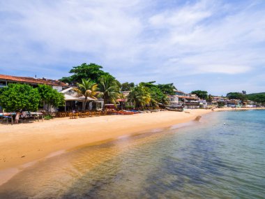 View of the beach on Joao Fernando Island, Arraial do Cabo, Brazil clipart