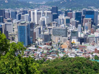 Seoul, South Korea - May 13, 2024: City aerial view from the viewpoint terrace in front of the Namsan Seoul Tower.