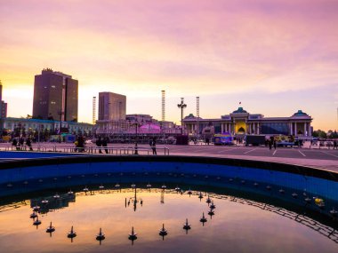 Ulaanbaatar, Mongolia - May 24, 2024: View of Sukhbaatar square and the Parliament of Mongolia at sunset.