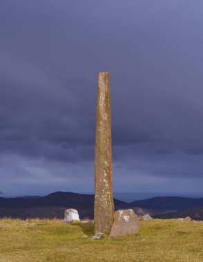 Menhir of Eteneta. Menhir and cromlech of Eteneta, mount Adarra, Euskadi clipart