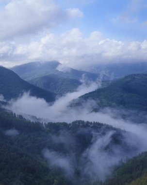 Clouds and mists. Clouds and mists cover the Aiako Harriak Natural Park in the Basque Country. clipart