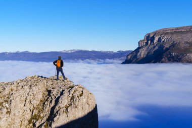 Hiker in the Natural Park of Urbasa and Andia, Navarra. clipart