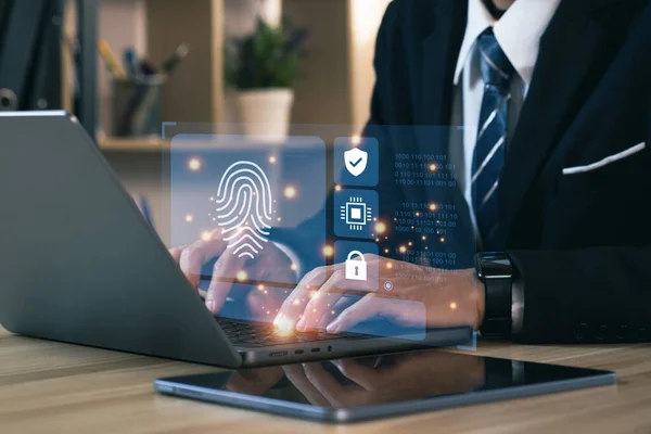 stock image Businessmen using a computer to cyber security digital technology, business people use fingerprints to access personal cybersecurity, keeping users' personal information safe. Concept of surveillance.