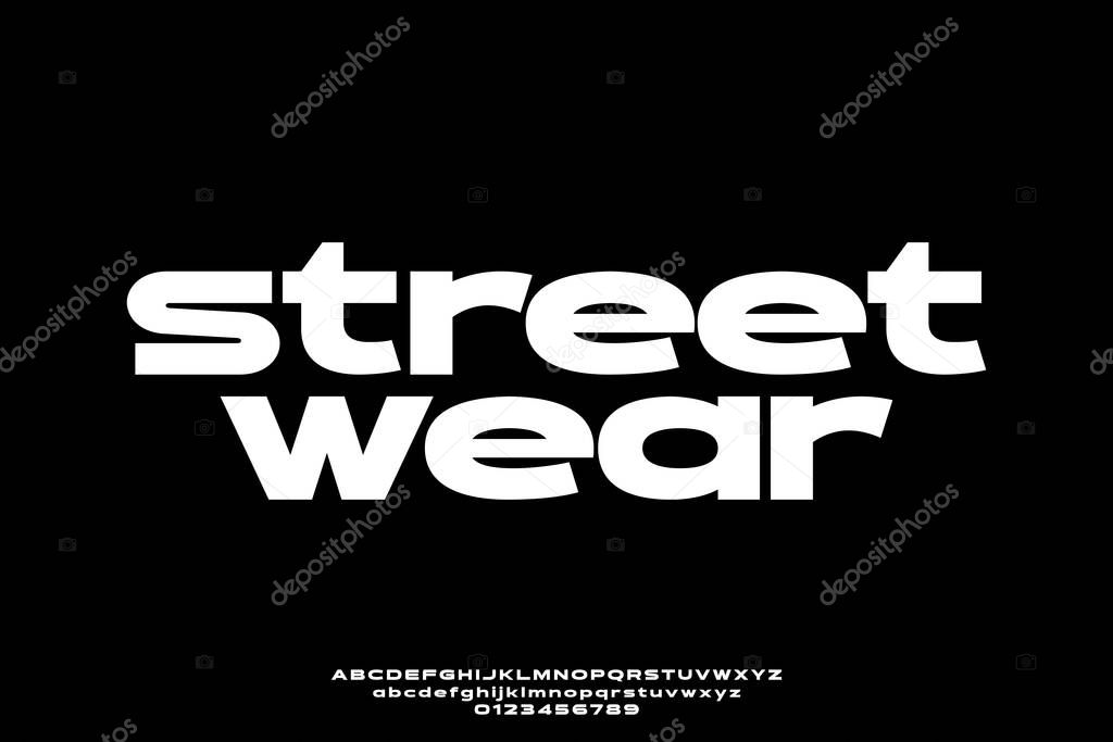 Modern wide street wear style alphabet display font vector. Trendy urban typeface
