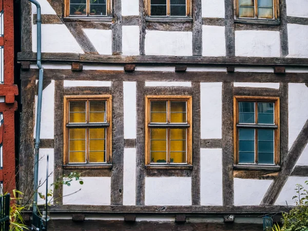 half - timbered house with windows and windows in the old town of strasbourg