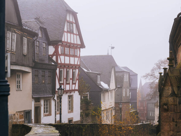 Marburg old town in fog and haze, Ritterstrasse in December