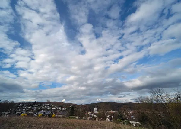Evening clouds over the fields in Marbach, March, wide angle perspective