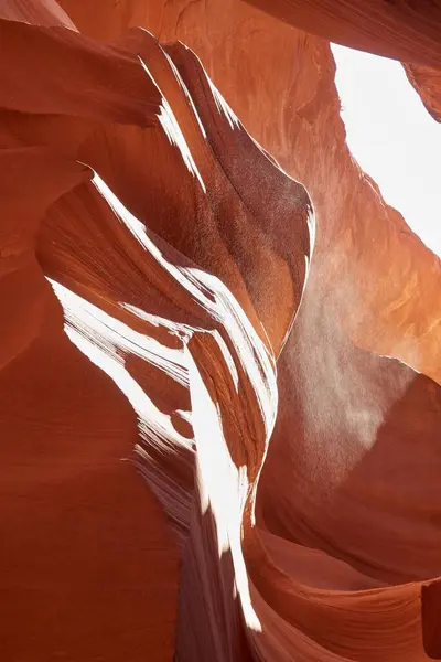 Antelope Canyon is a long slot canyon comprised of Navajo sandstone thats been eroded by flash floods over the course of millennia. Its known for its orange and pink hues and its unique shapes.