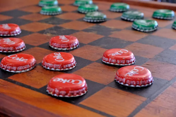 Close Vintage Checkerboard Using Old Bottle Caps Game Pieces — Stock Photo, Image