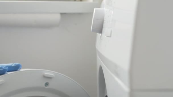 Hand Stopping Washing Machine Button Housekeeper Sets Laundry Machine Function — Vídeo de stock
