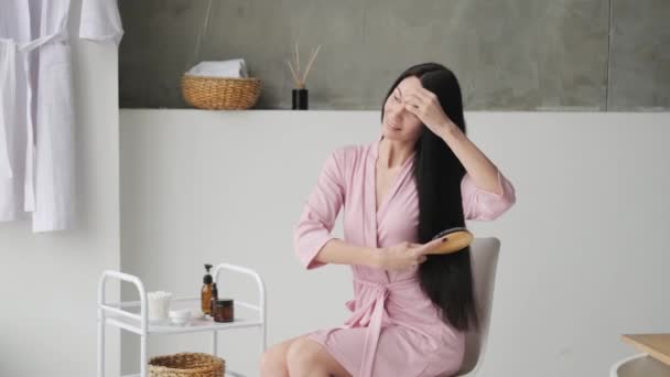 Attractive Woman Brushing Her Long Brunette Voluminous Long Hair Bathroom — Stock Video