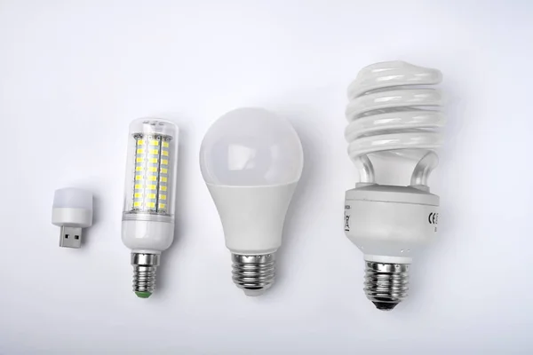 Types of energy efficient light bulbs. LED bulb, mercury bulb, incandescent bulb