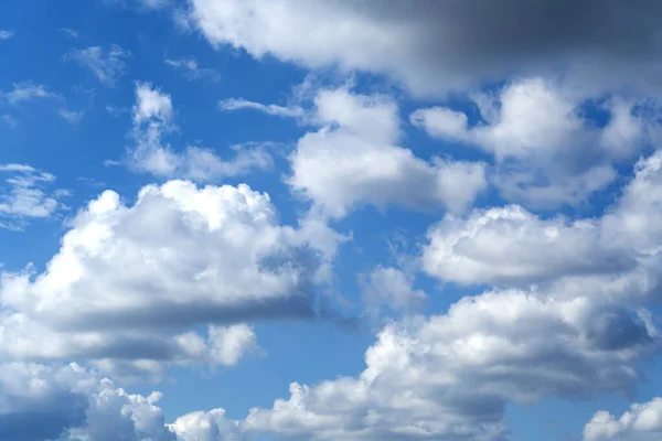 stock image Sunny blue sky with clouds. Clouds move smoothly across the sky