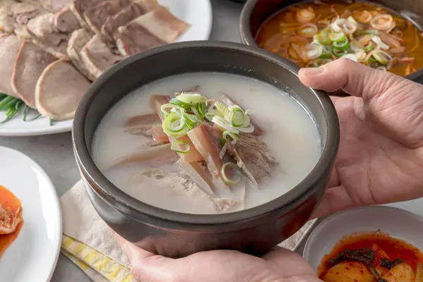Korean food dish Beef head gukbap, boiled pork, beef, yukgyejang, side dishes