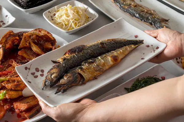 Korean food dish Braised pollack, braised pollack, braised short ribs, grilled mackerel, grilled fish, grilled mackerel, grilled hairtail, side dishes